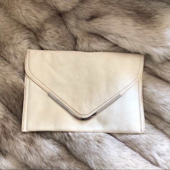 BCBG Handbags - BCBG White Snake Skin Clutch